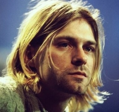 In the photo is shown photo of Kurt Cobain